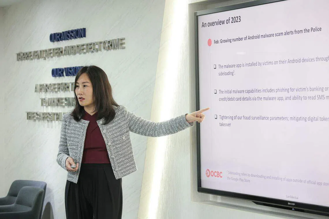 华侨银行集团法律与条规遵循总裁阮玲介绍说明银行如何打击恶意软件相关骗案。（李冠卫摄）