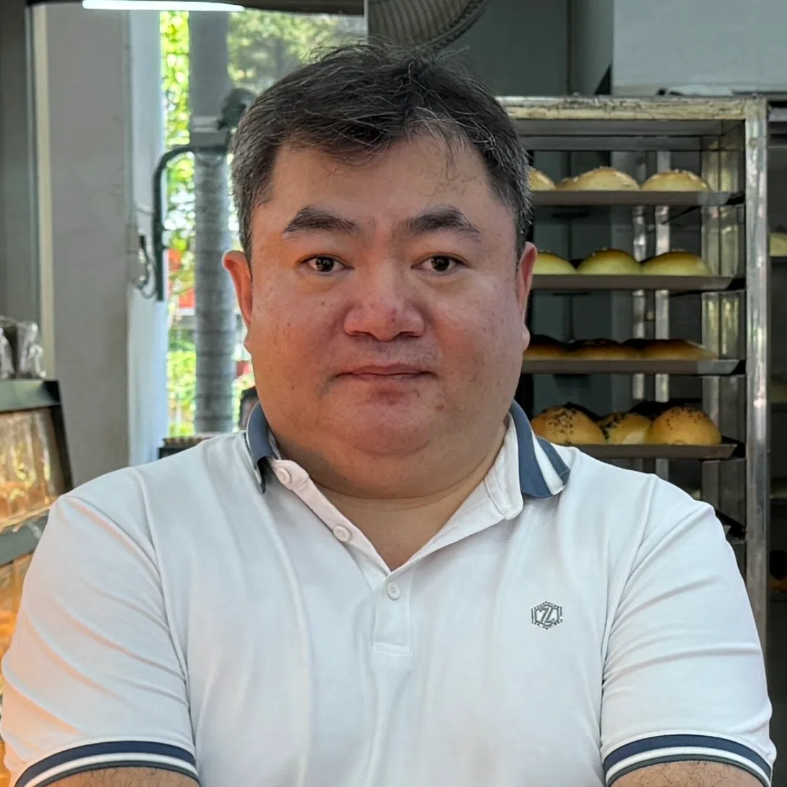 康昇源于2006年创办Juz Bread面包工坊，目前开了15间店。（林佳敏摄）