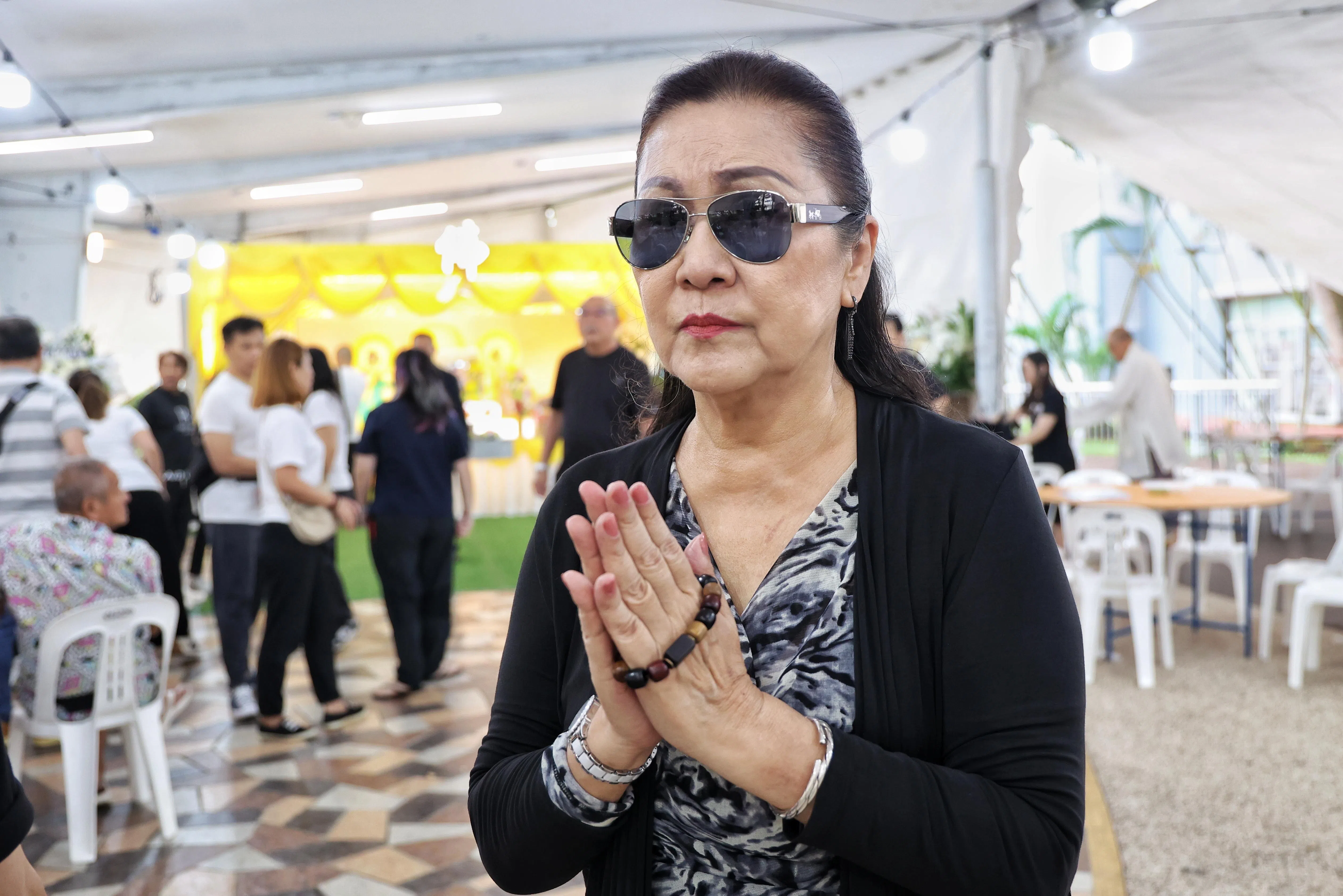 陈明佩形容，这场告别式送走了她眼中的“新加坡当代花美男”。（《新明日报》提供）