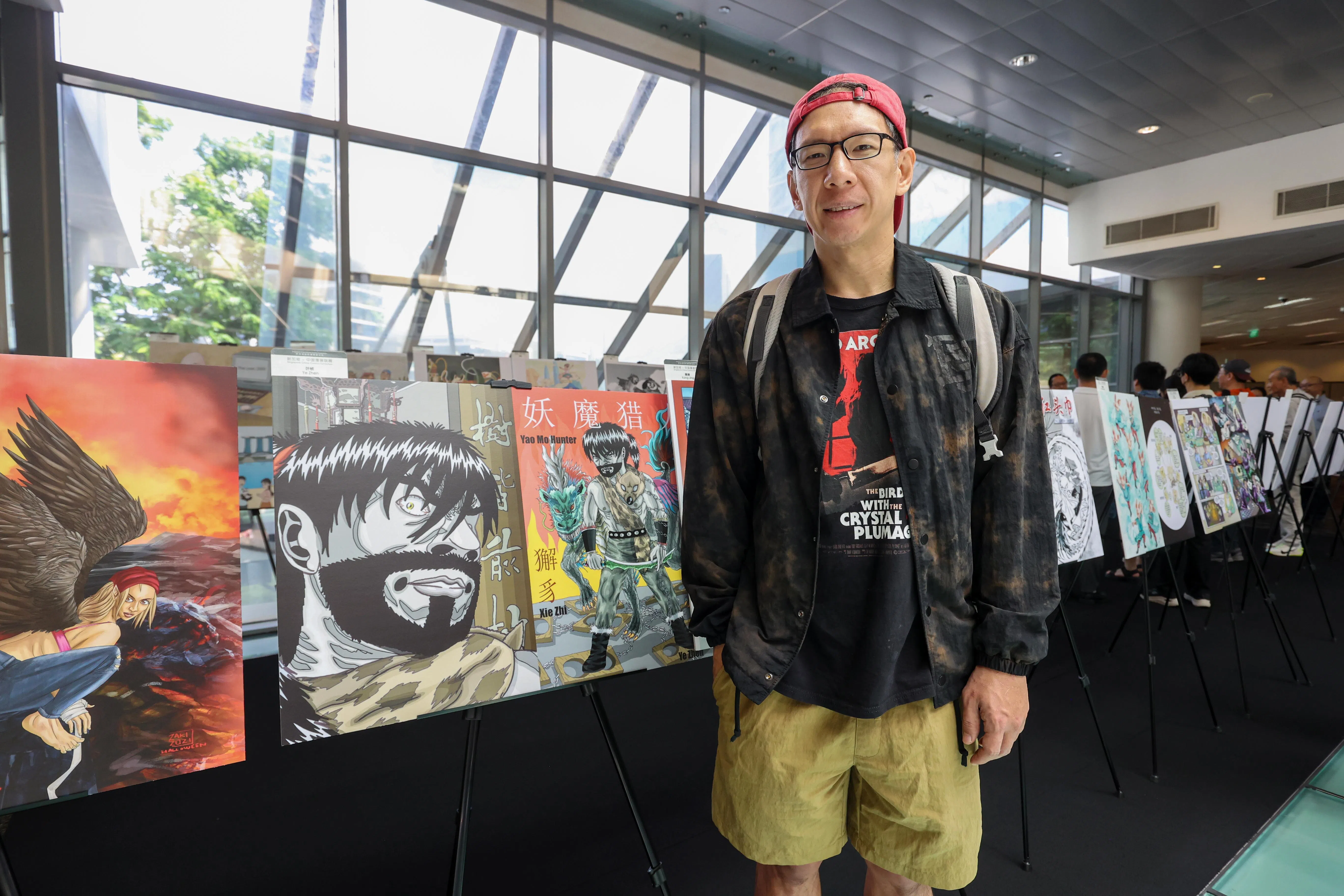 本地漫画家叶桢是个乐天派，认为“坚持画下去就一定可行”。（游甯稀摄）