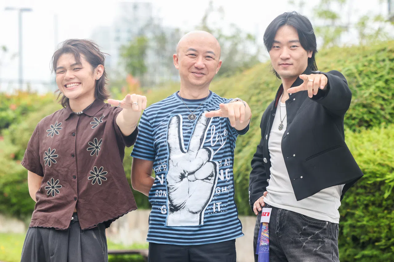 BZ1认为许环良（中）亦师亦友，会传授他们技能，也会和他们进行真诚的交流。（陈斌勤摄）