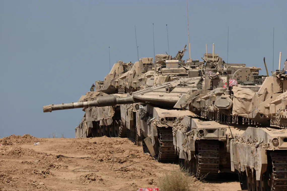 以色列军队周二（9月16日）黎明前对加沙城发动地面攻势后，以军坦克周三在加沙地带边界集结。（法新社）