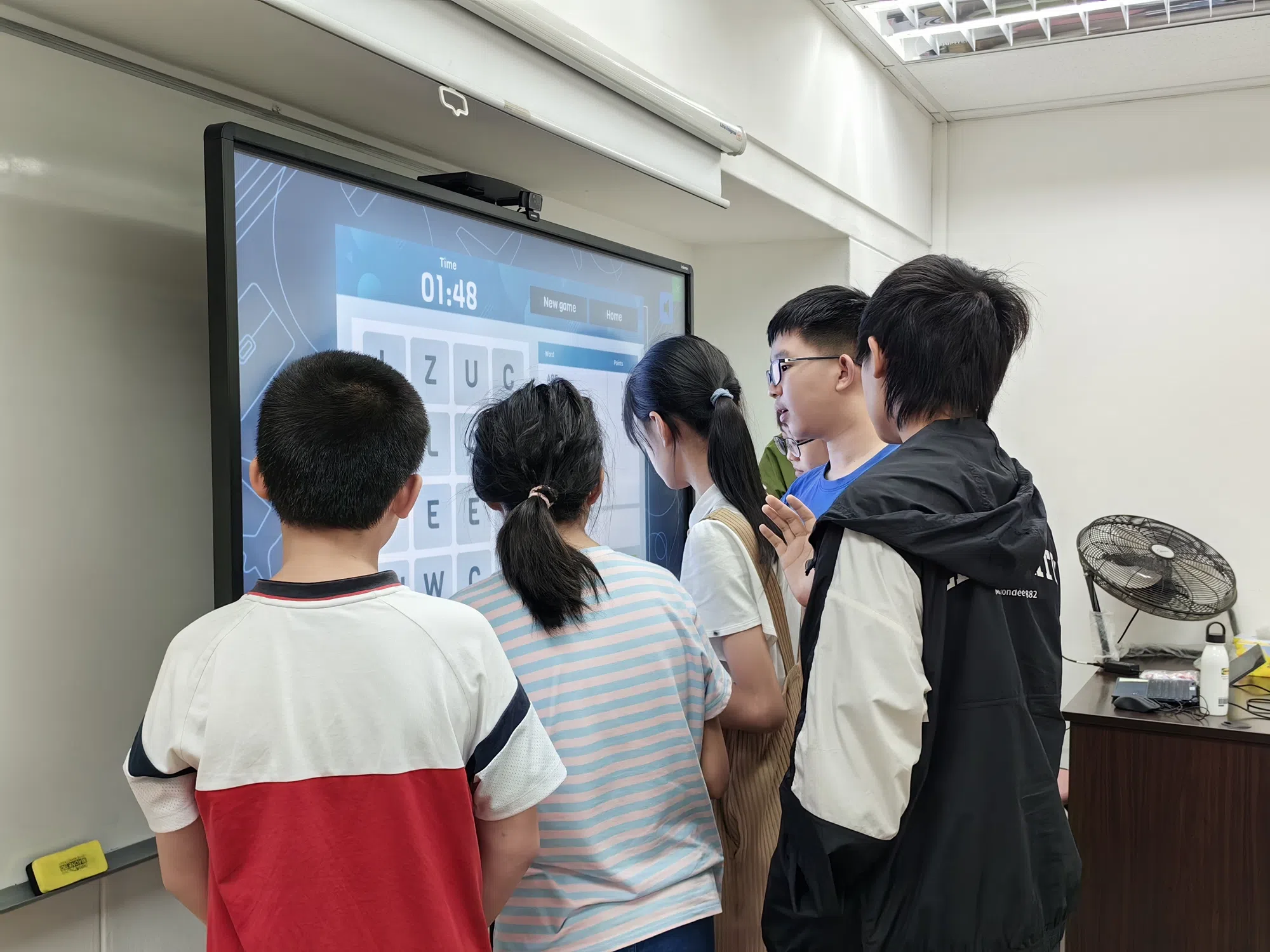 春天国际学院帮助学生在趣味中学习。（贺玉荣摄）