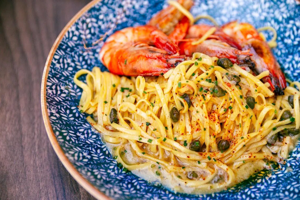 Duomo Ristorante的烤虾柠檬意大利细宽面富有虾肉的鲜甜。（餐馆提供）