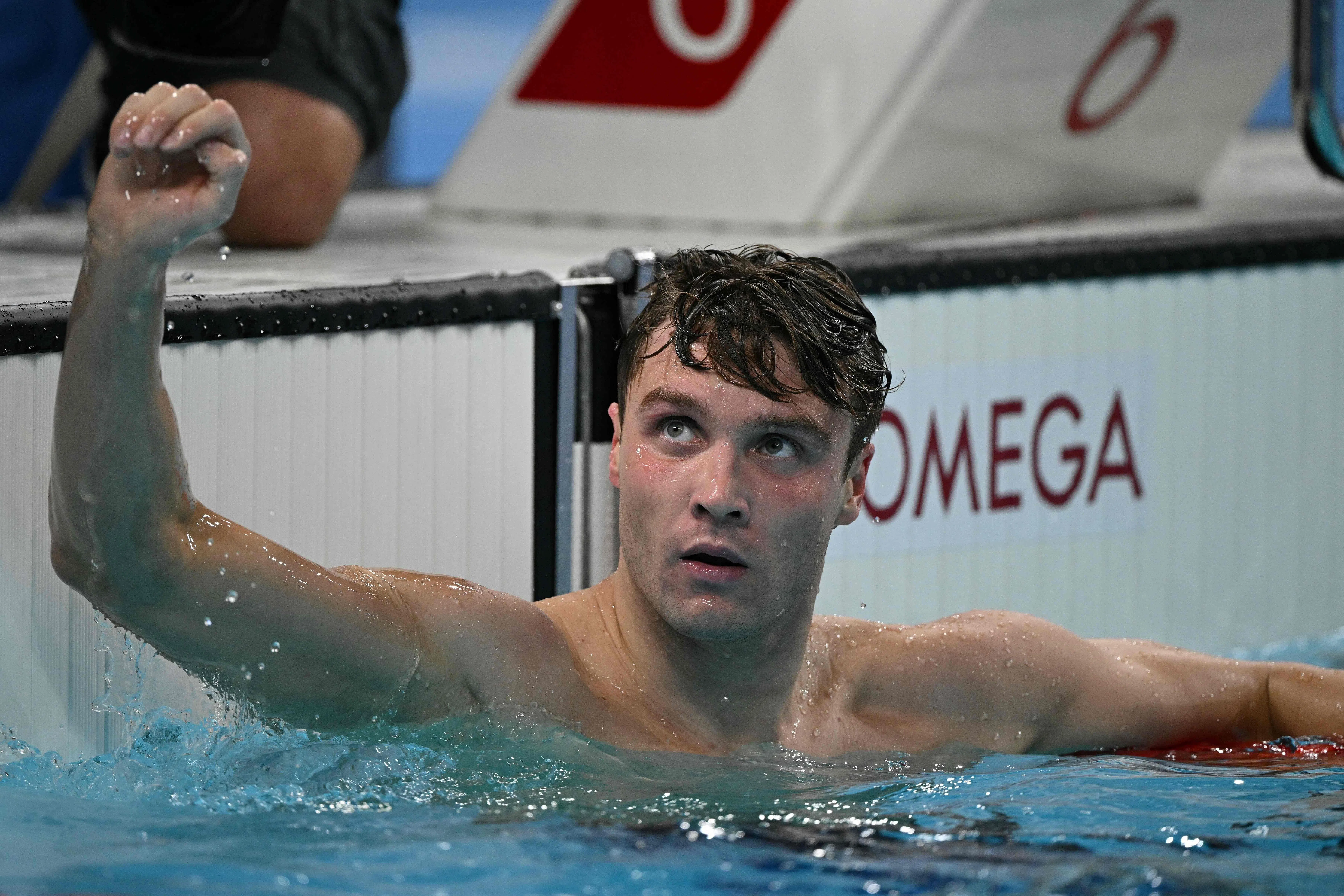 芬克打破孙杨12年前的男子1500米自由泳世界纪录，并卫冕成功。（法新社）