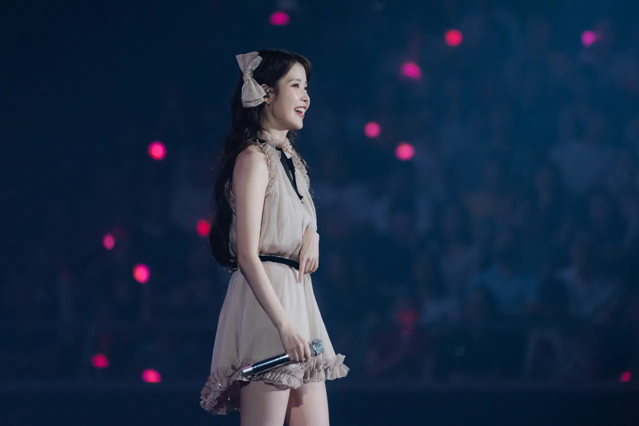 IU暖心向狮城粉丝告白，透露她喜欢新加坡的原因。（iMeSG、EDAM Entertainment提供）