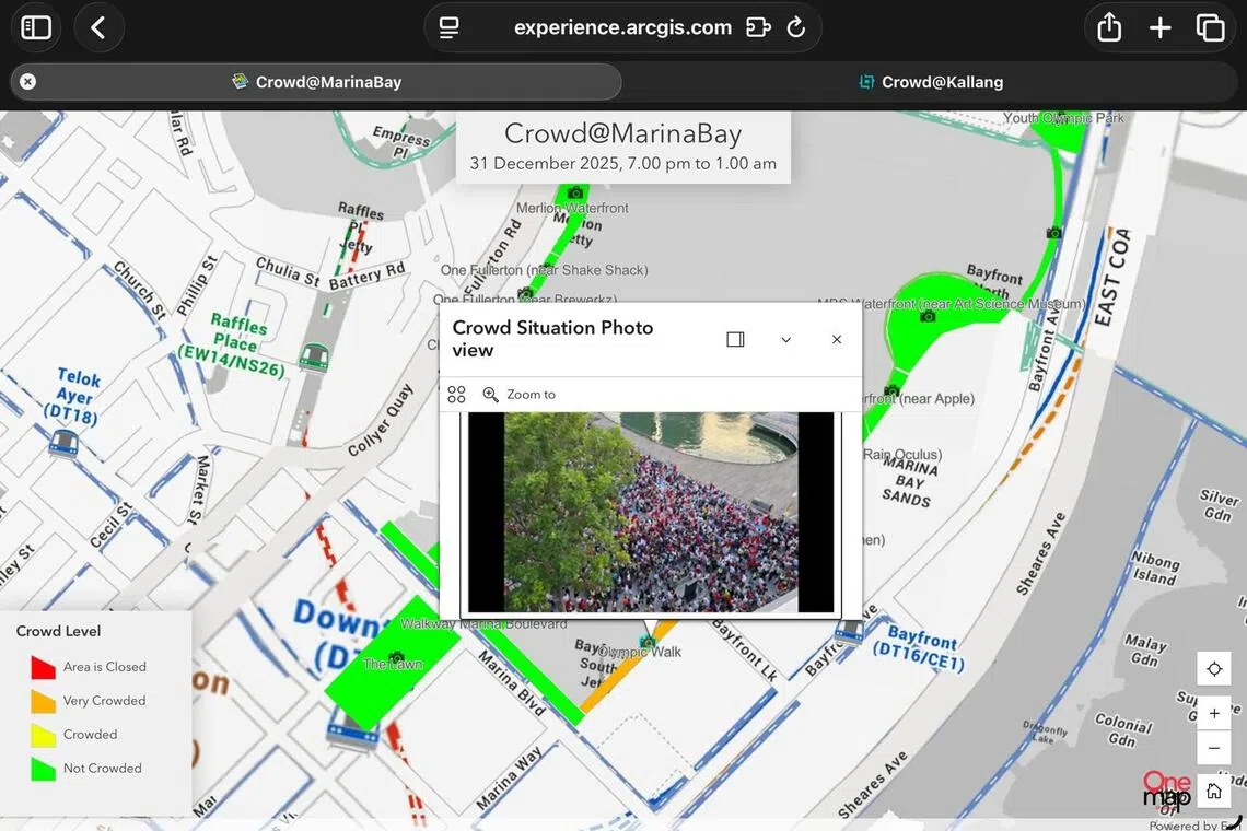 Crowd@MarinaBay网页截图左下角显示四种颜色图例，截图可见大多数区域都显示绿色（不拥挤），唯一呈橙色（人潮颇为拥挤）的是奥林匹克步行道（Olympic Walk）区域，点击相机图标，就会弹出那一处现场实时照片。（新加坡警察部队提供）