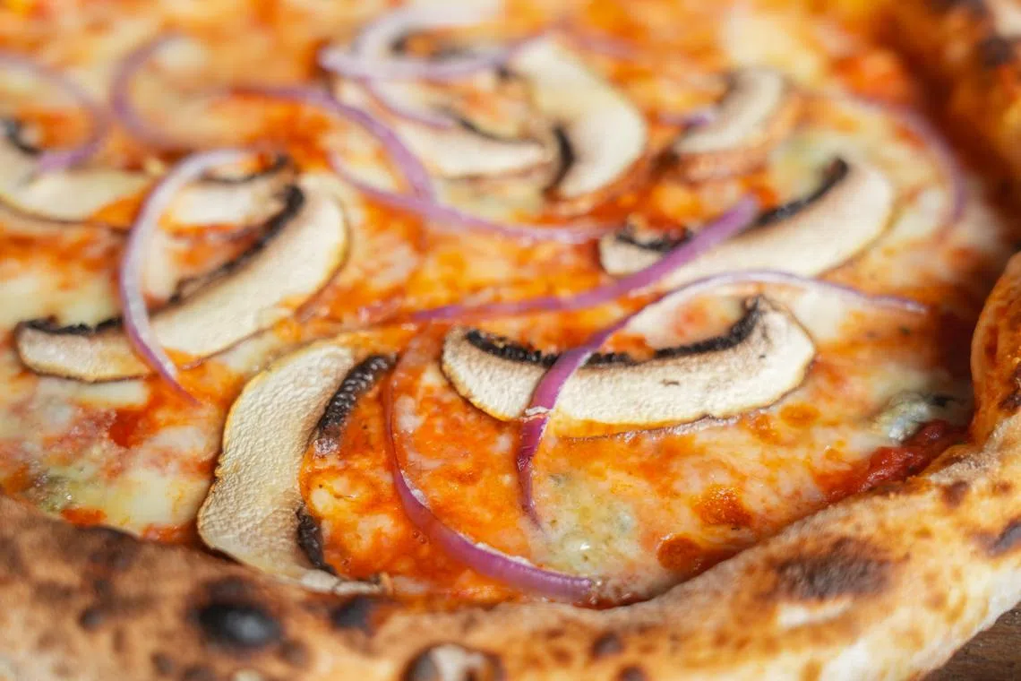 La Pizzaiola的比萨新品，以蓝纹芝士画龙点睛。（餐馆提供）