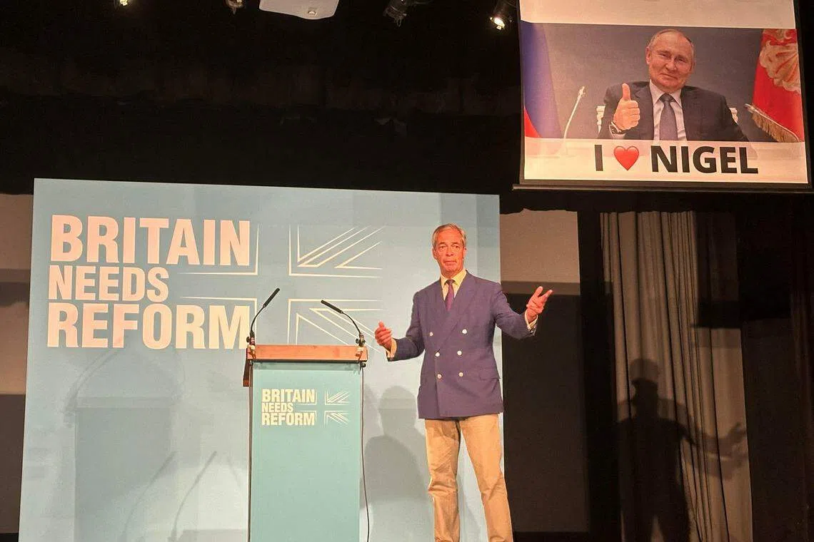 法拉奇6月29日在一场选举集会演讲时，身后的电子屏幕突然出现俄罗斯总统普京微笑并竖起大拇指的横幅。（路透社）