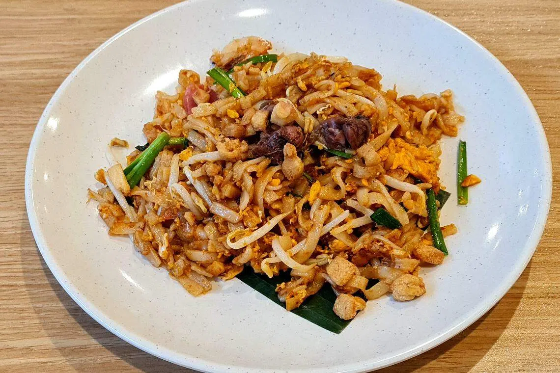 槟·乡的槟城炒粿条，甜咸鲜香，带焦香镬气。（叶晓虹摄）