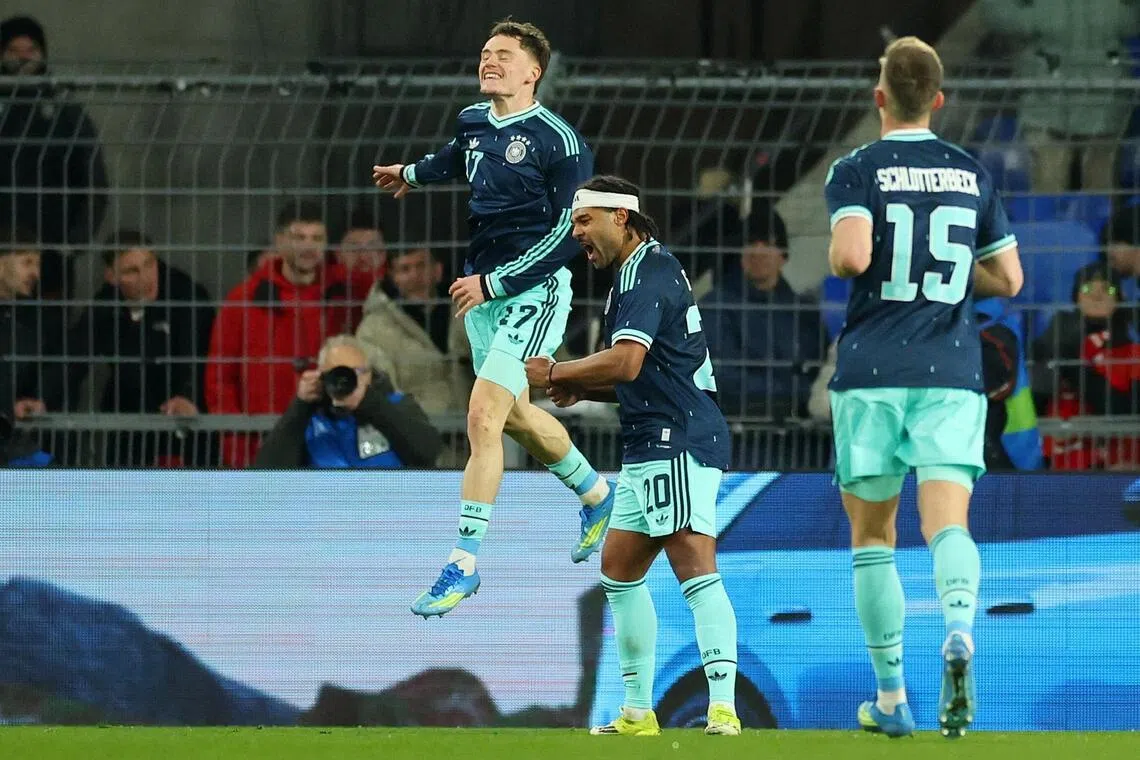 维尔茨（跃起者）表现出色，两传两射，助德国队以4比3逆转战胜瑞士。（路透社）