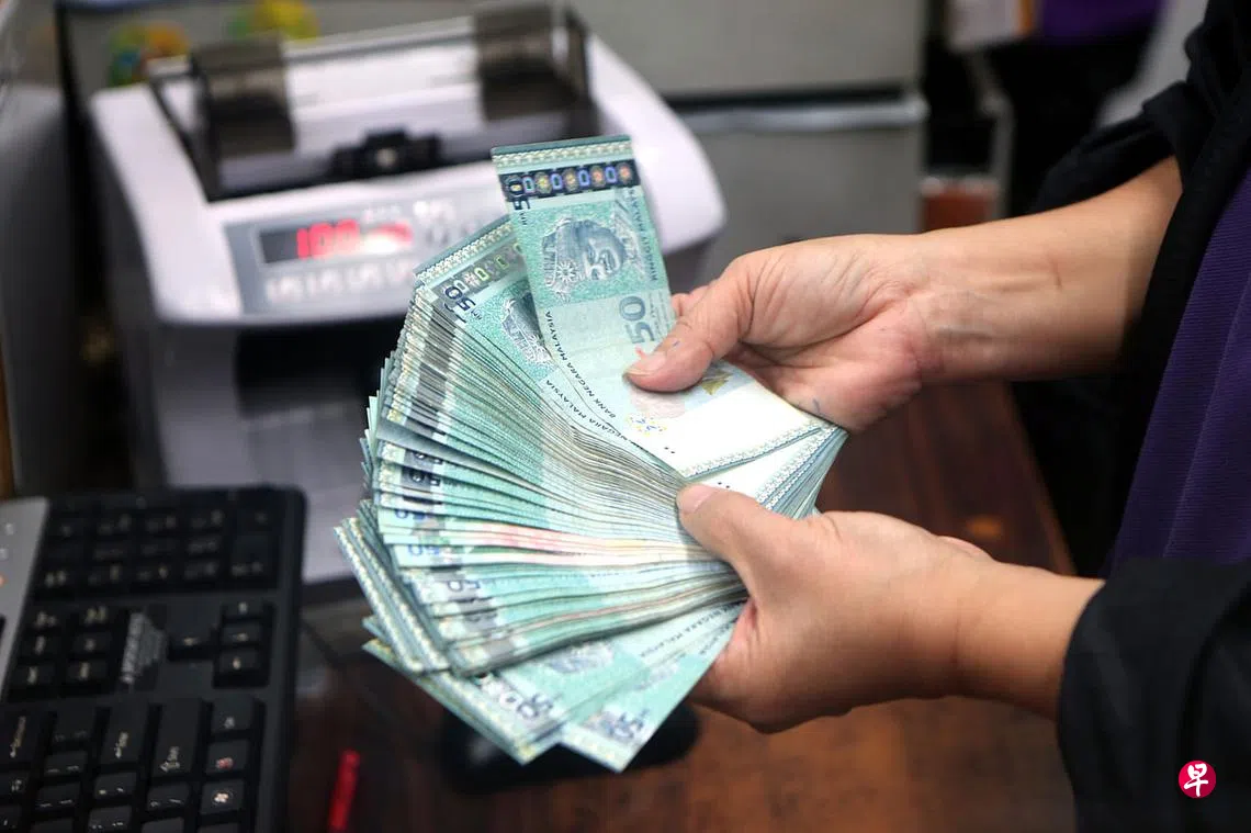 马国央行前副总裁反对令吉再与美元挂钩| 联合早报