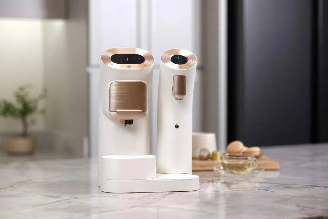 Wells Home Café咖啡与茶机具有世界首创分隔咖啡和茶饮的双出水口设置，避免饮料混合影响口味。（商家提供）