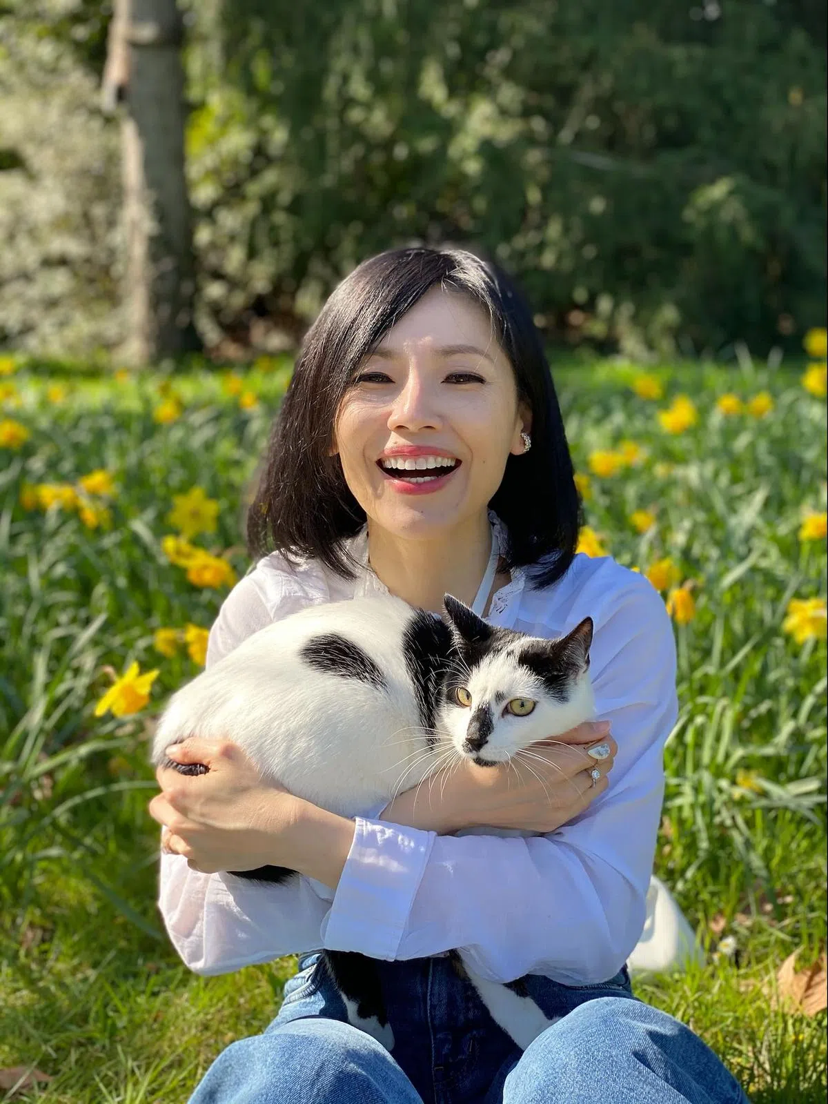 欧菁仙有爱猫Rudon陪伴，一样感受到爱。（受访者提供）