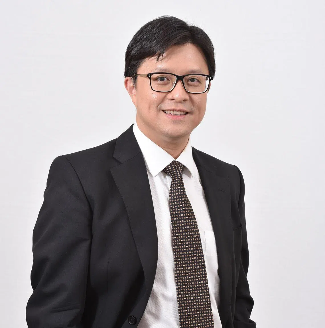 杨子健说，随着政策即将改变，公众须意识到更多机构将持有他们的身份证号码，切勿因为对方知道自己的身份证号码就放松警惕，误以为对方一定是合法机构或人员。（新加坡法律学会提供）