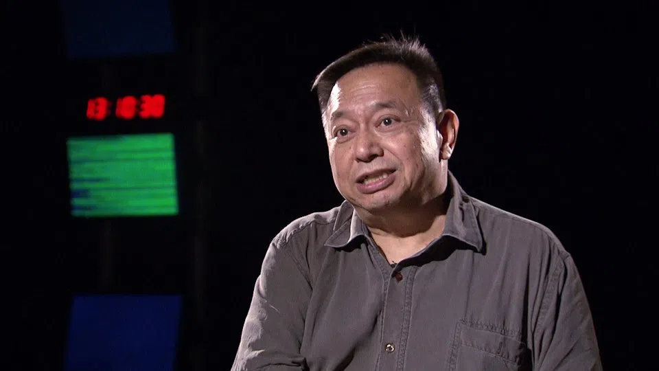 超级“李小龙迷”李志远立志追查偶像死因真相。（视频截图）