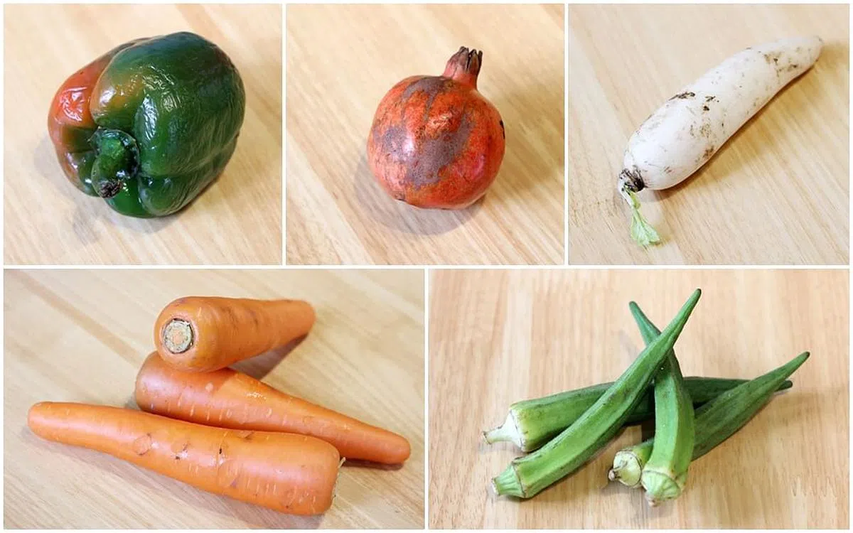 获救蔬菜多数只有外表上的瑕疵，部分状况良好，乍看之下无异于一般蔬菜。（梁麒麟摄）