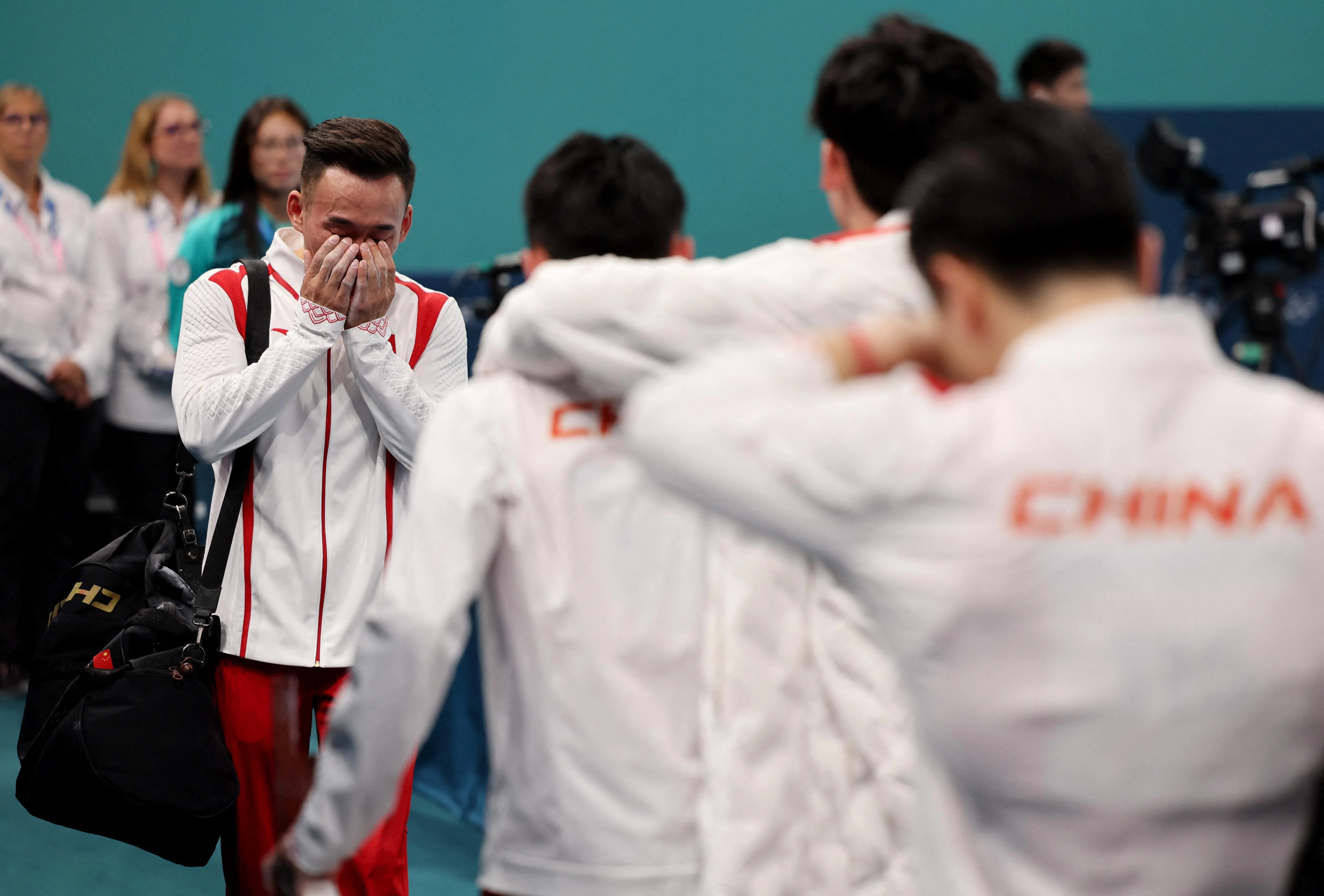 大好局势下丢金，中国队显得失落不已。（路透社）