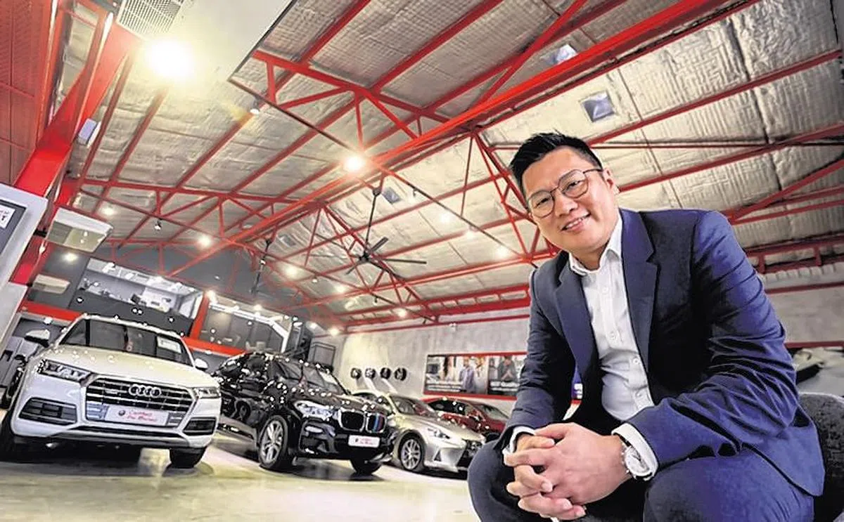 陈振发看好本地市场对旧车的需求。（受访者提供）