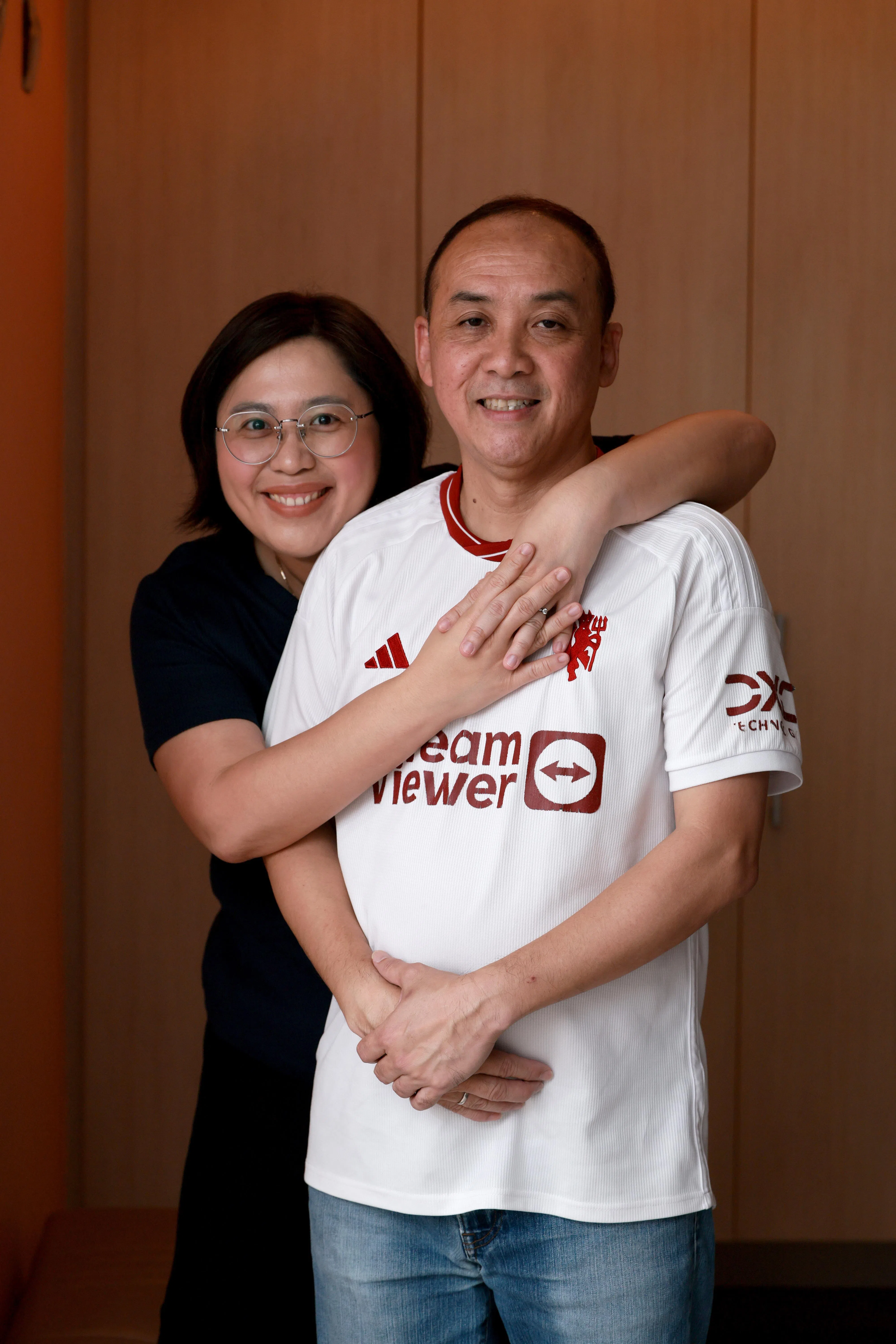 龙国成和太太伍文珠以理解与包容经营婚姻，共同组建幸福家庭。（龙国雄摄）