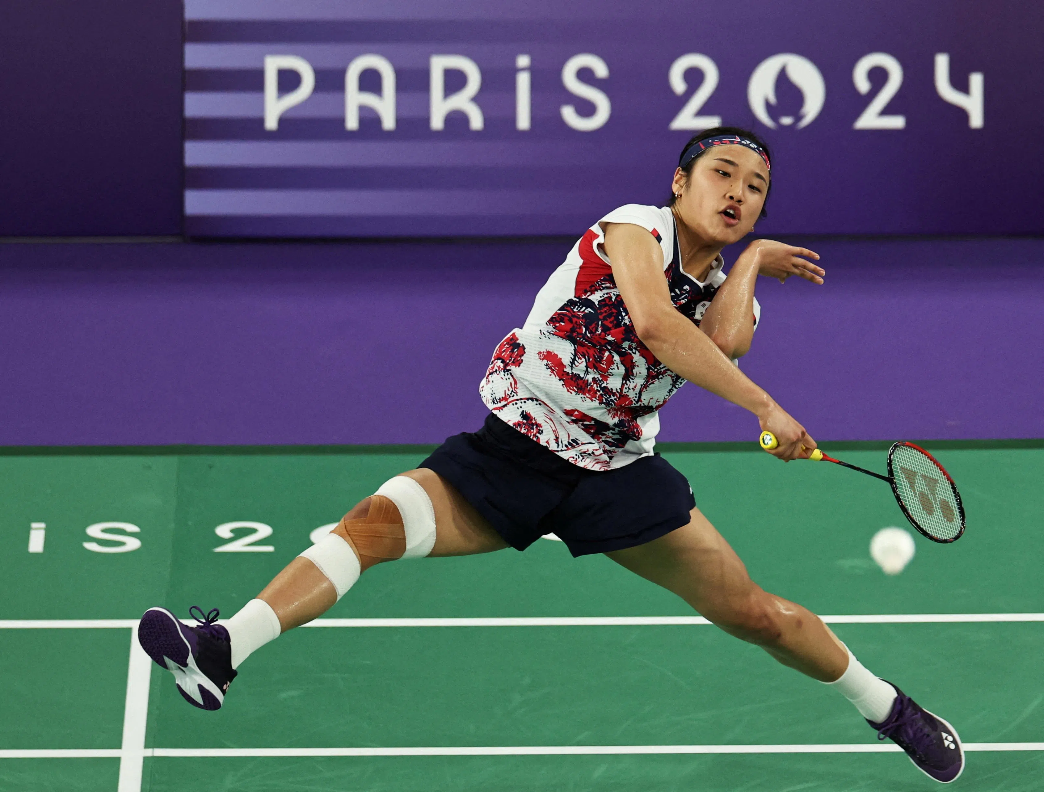 安洗莹在决赛中战胜中国选手何冰娇，首次夺下奥运金牌。（路透社）