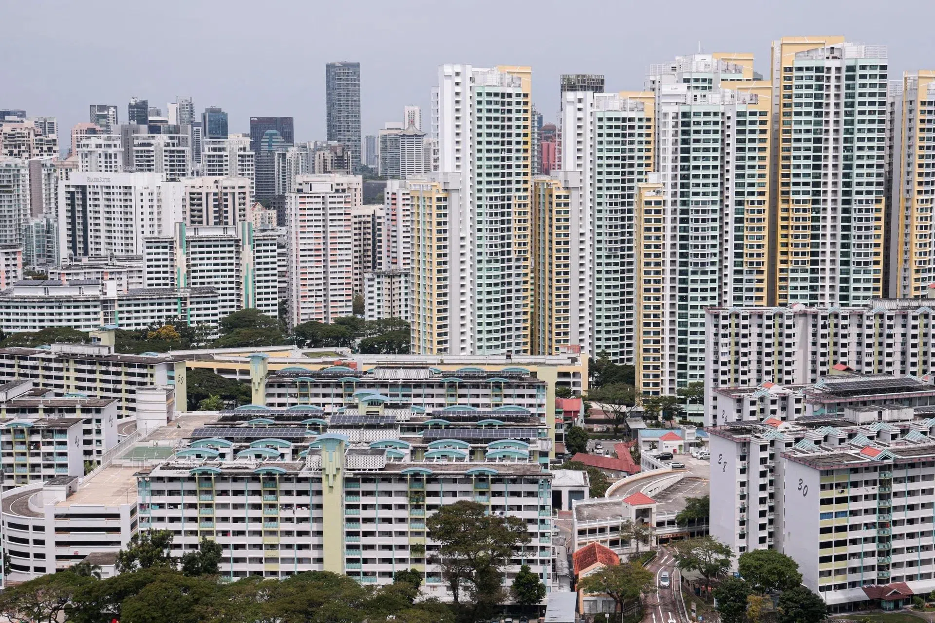经过多年经营，新加坡如今有约八成人口住在组屋，九成人口拥屋。（联合早报）