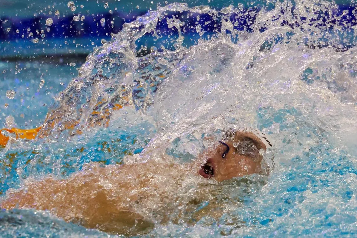 连续参加两场决赛，柯正文在拿手的男子100米仰泳感到疲惫，最终排名第三。（白艳琳摄）