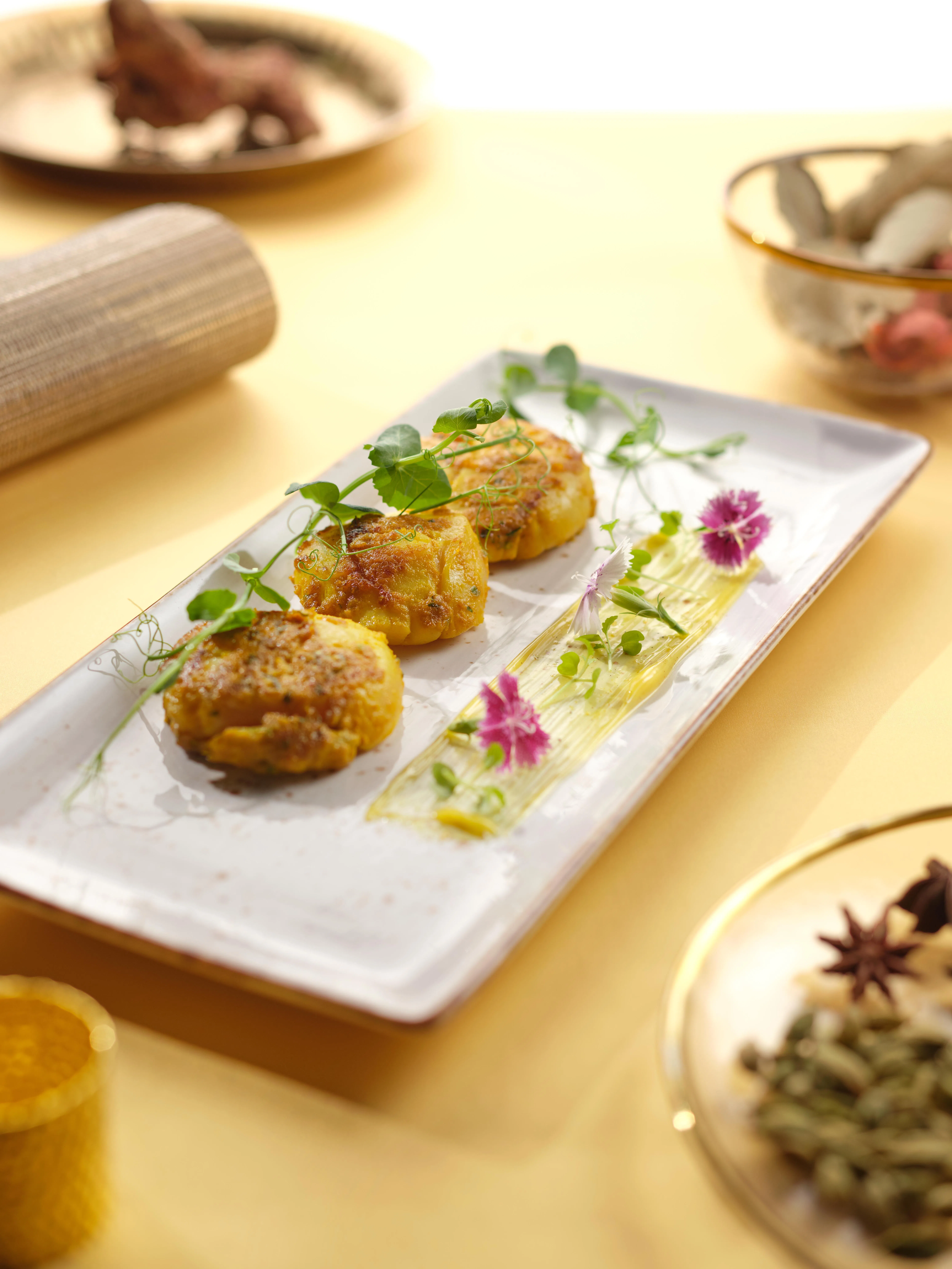 Tali扇贝选用北海道扇贝，以姜黄与生姜轻腌，再以香料煎制。（餐馆提供）