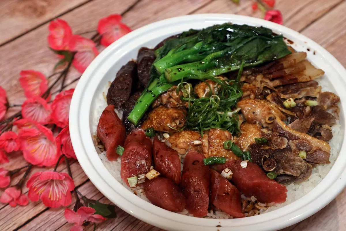 港式腊味饭。（邝启聪摄）