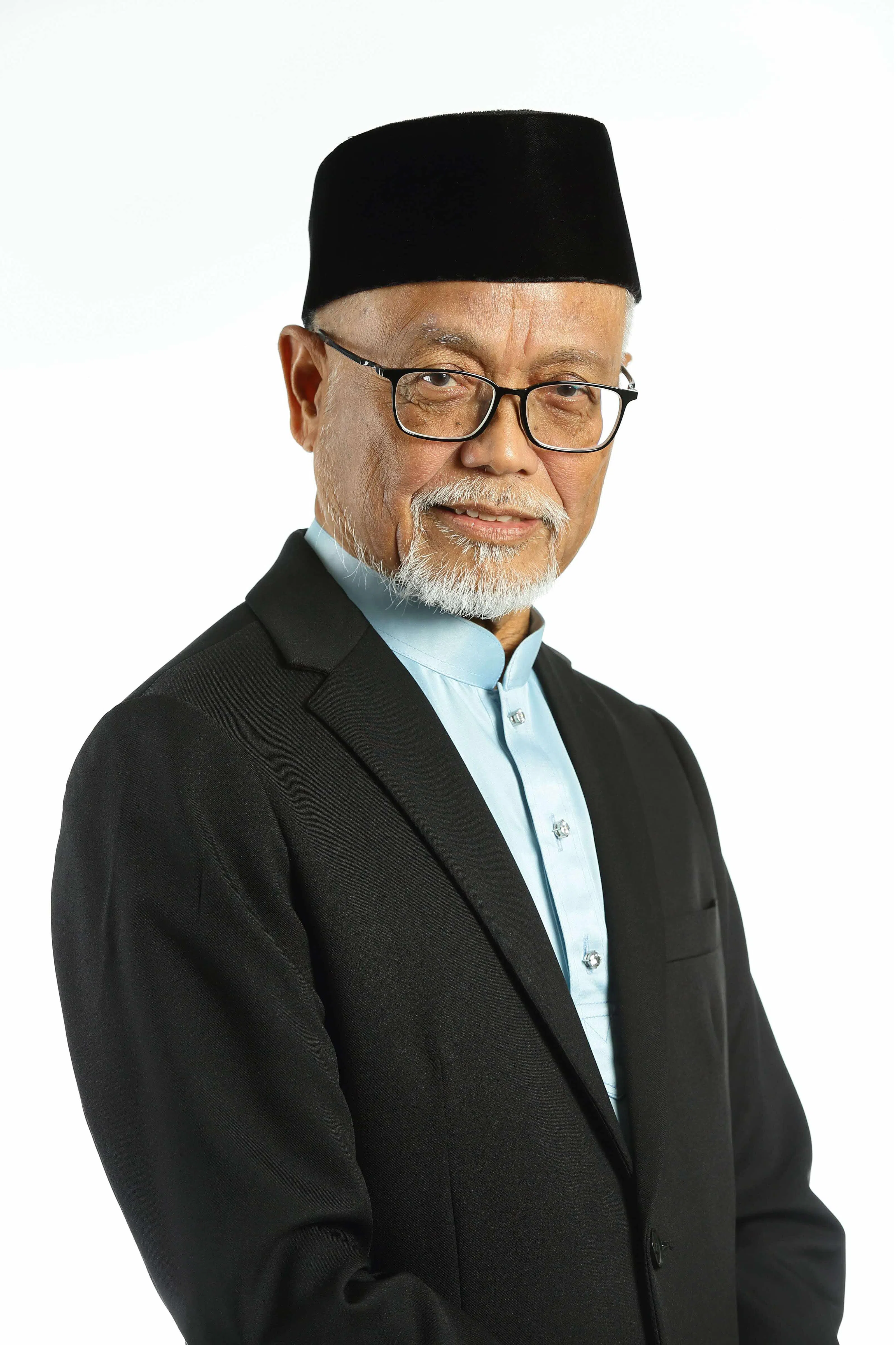 回教宗教师帕斯尼·穆兰（Ustaz Pasuni Maulan），为社群服务近30年，贡献卓著。（新加坡回教理事会提供）