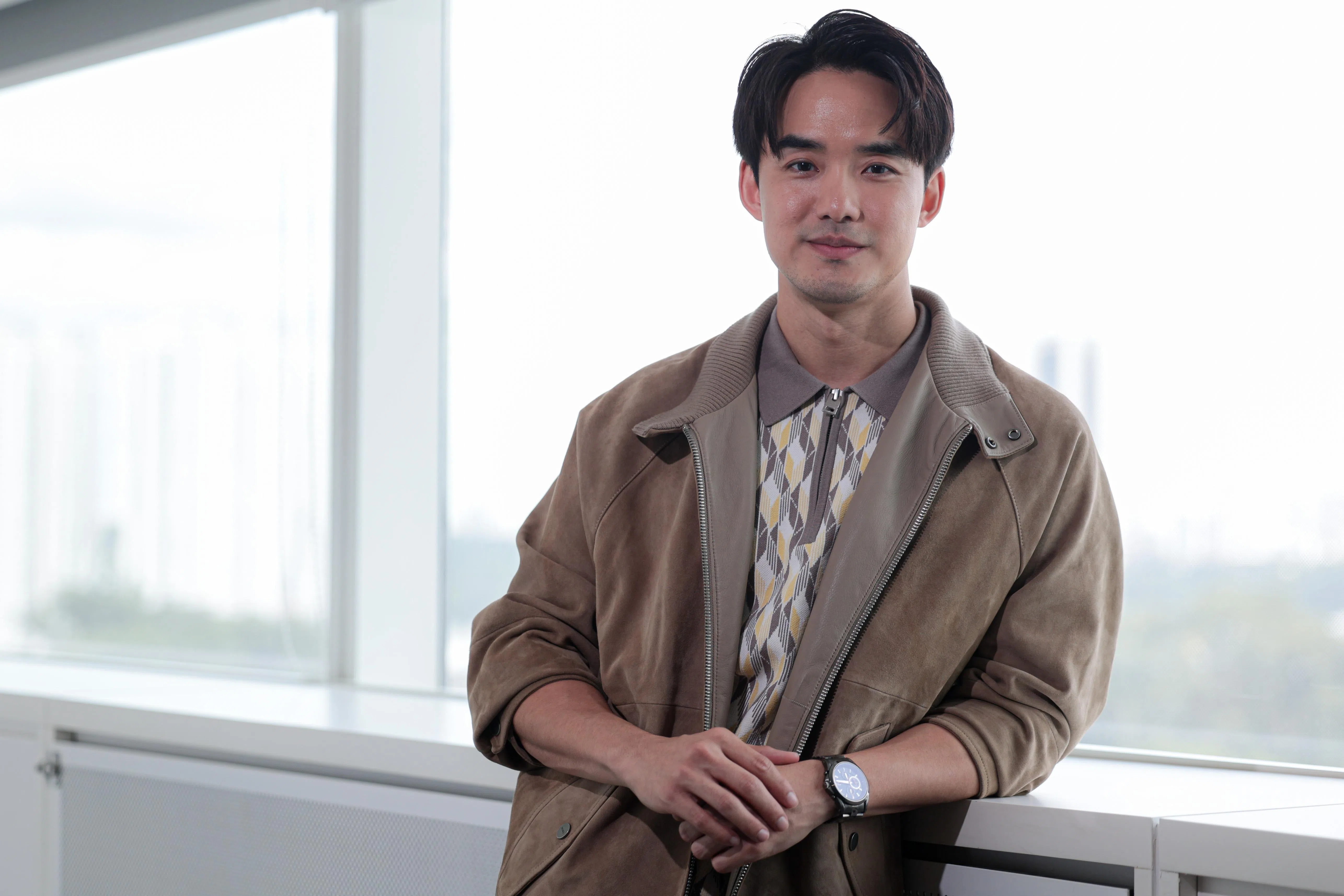 黄超群在剧中扮演富二代“白起家”，与邓伟德角色曾是好友。（李冠卫摄）