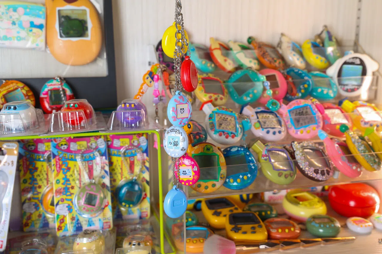 迷你款电子宠物挂饰，方便随身携带。（吴先邦摄）