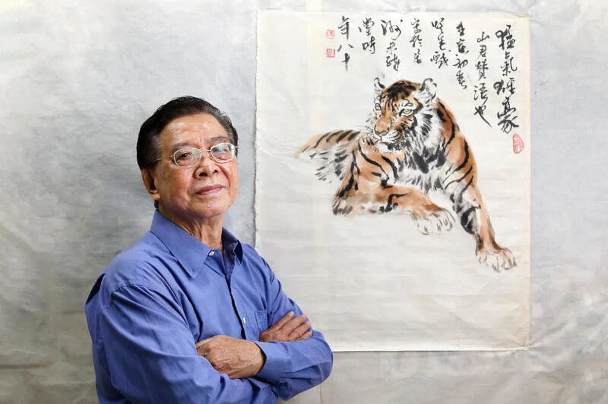 画家陈悟迟是本地唯一精于画虎，并以虎画闻名。（龙国雄摄）