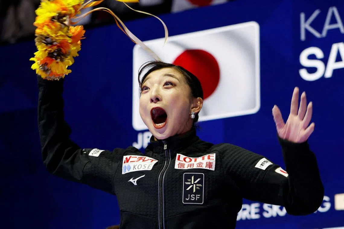 坂本花织得知自己拿下生涯最高分后，激动地跳起庆祝。（路透社）