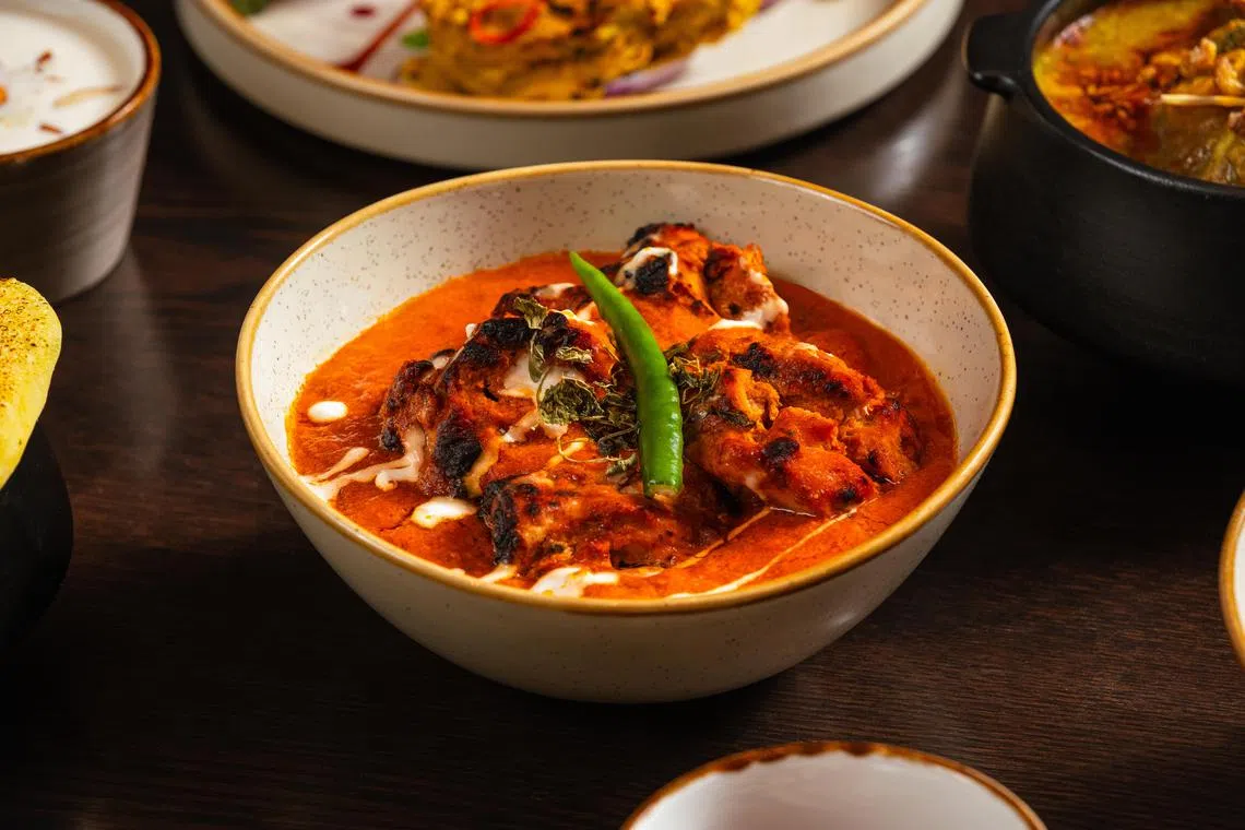 SanSara的印度烤鸡肉料理“Kukkad Makhan Masala”，拌有浓郁番茄和牛油酱。（餐馆提供）