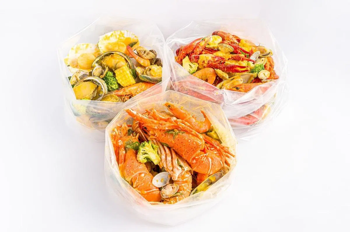 Lobstar的三种海鲜袋，分别主打龙虾、南非鲍和小龙虾。（品牌提供）