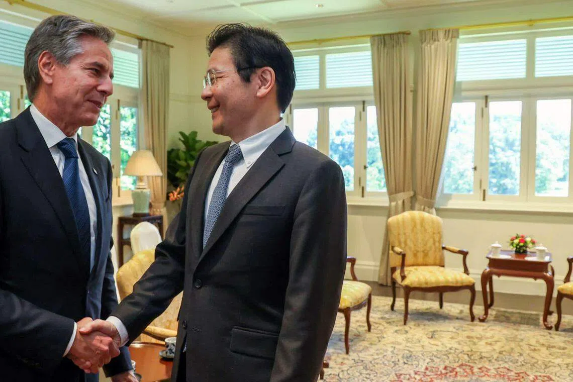 我国总理兼财政部长黄循财（右）星期三（7月31日）会见来新访问的美国国务卿布林肯。黄总理当天在脸书贴文写道，两人进行了良好的会谈，新美关系也处于良好状态。布林肯是从上星期六起（27日）展开亚洲行程，先后访问老挝、越南、日本、菲律宾和新加坡，接下来也将到蒙古。（取自黄总理脸书）