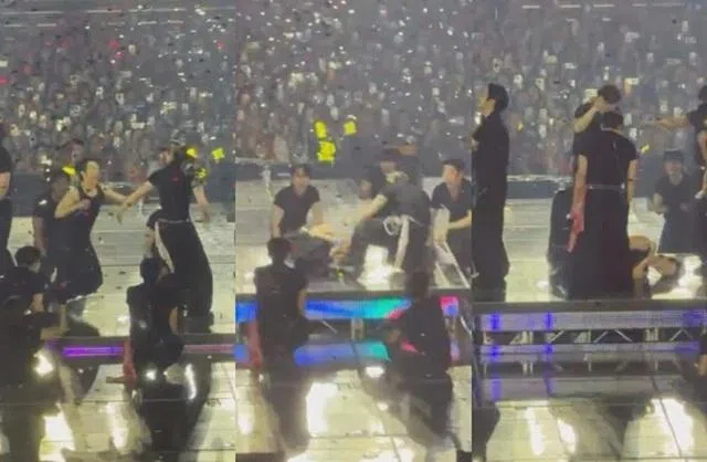 东海在台上摔倒，一度站不起身。（互联网）