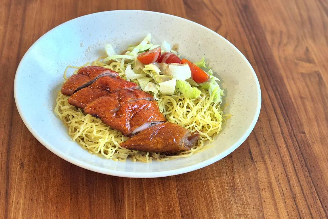 干拌面条软硬适中，拌酱调得恰到好处。（陈爱薇摄）