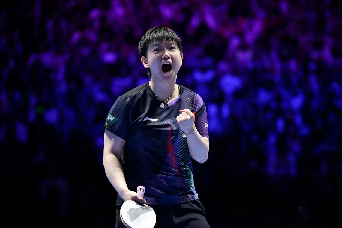 拿下重要一分，孙颖莎激动庆祝。（新华社）