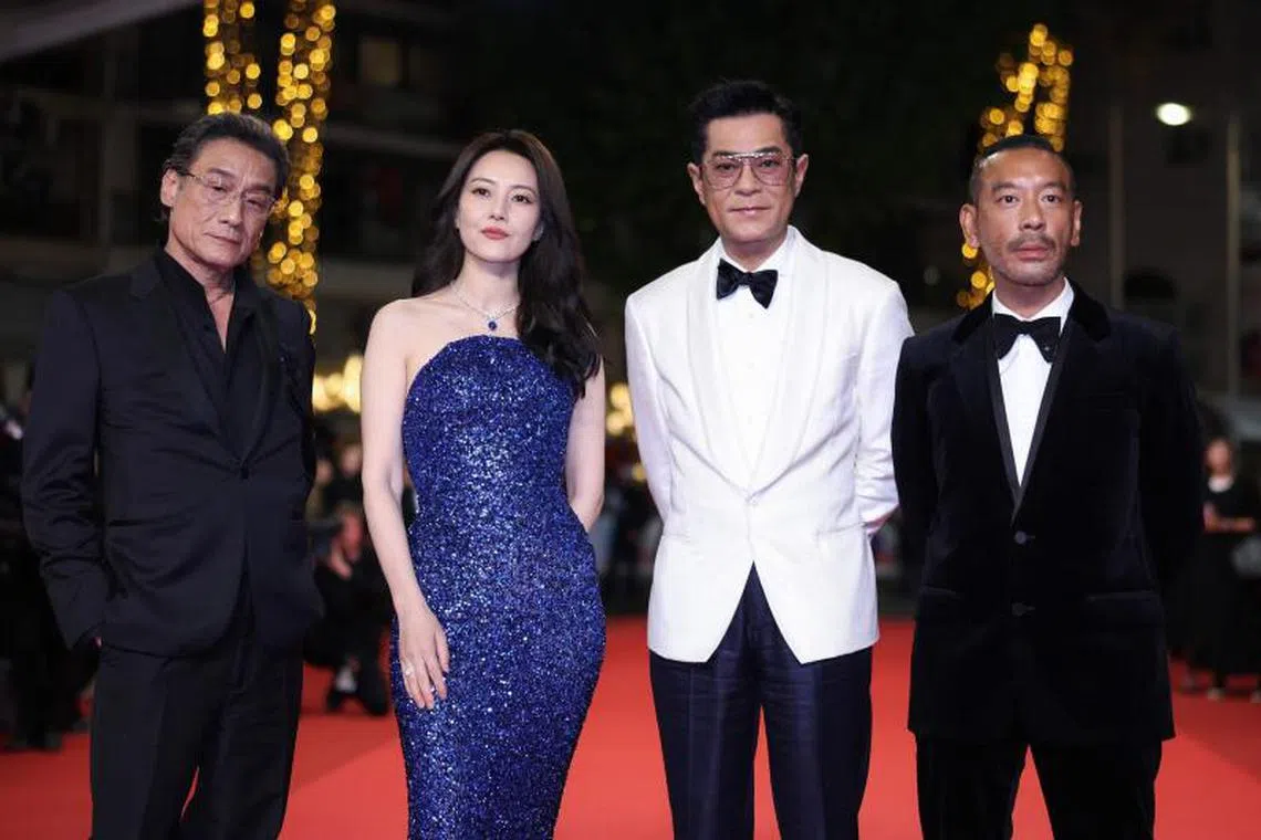 《风林火山》导演麦浚龙（右起）携古天乐、高圆圆及梁家辉亮相。（法新社）