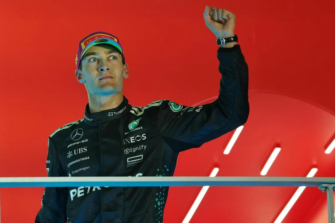 拉塞尔克服过去几年接连在新加坡站撞车的阴影，从杆位出发摘冠。（唐家鸿摄）