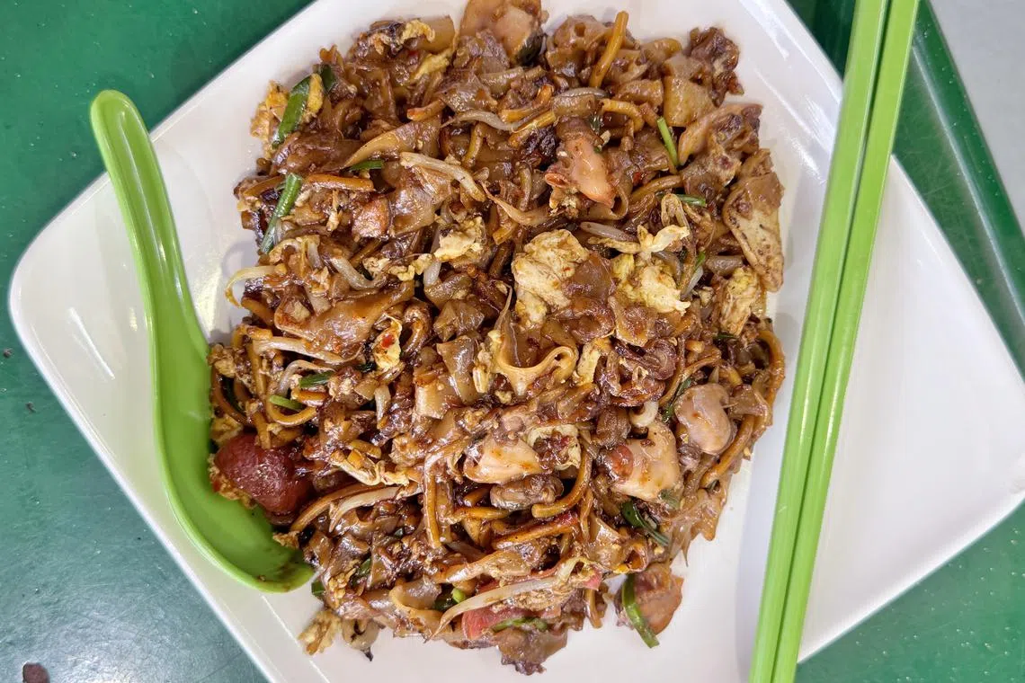 锡安路的18炒粿条香味诱人，粿条炒得带湿，并加入让人齿颊留香的猪油渣。（档案照）