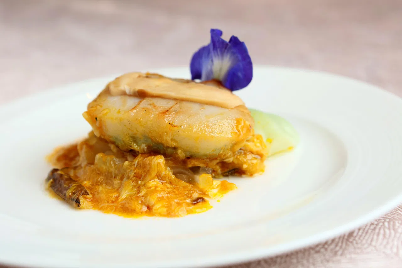 中餐馆李白的大闸蟹粉脆皮带子。（龙国雄摄）