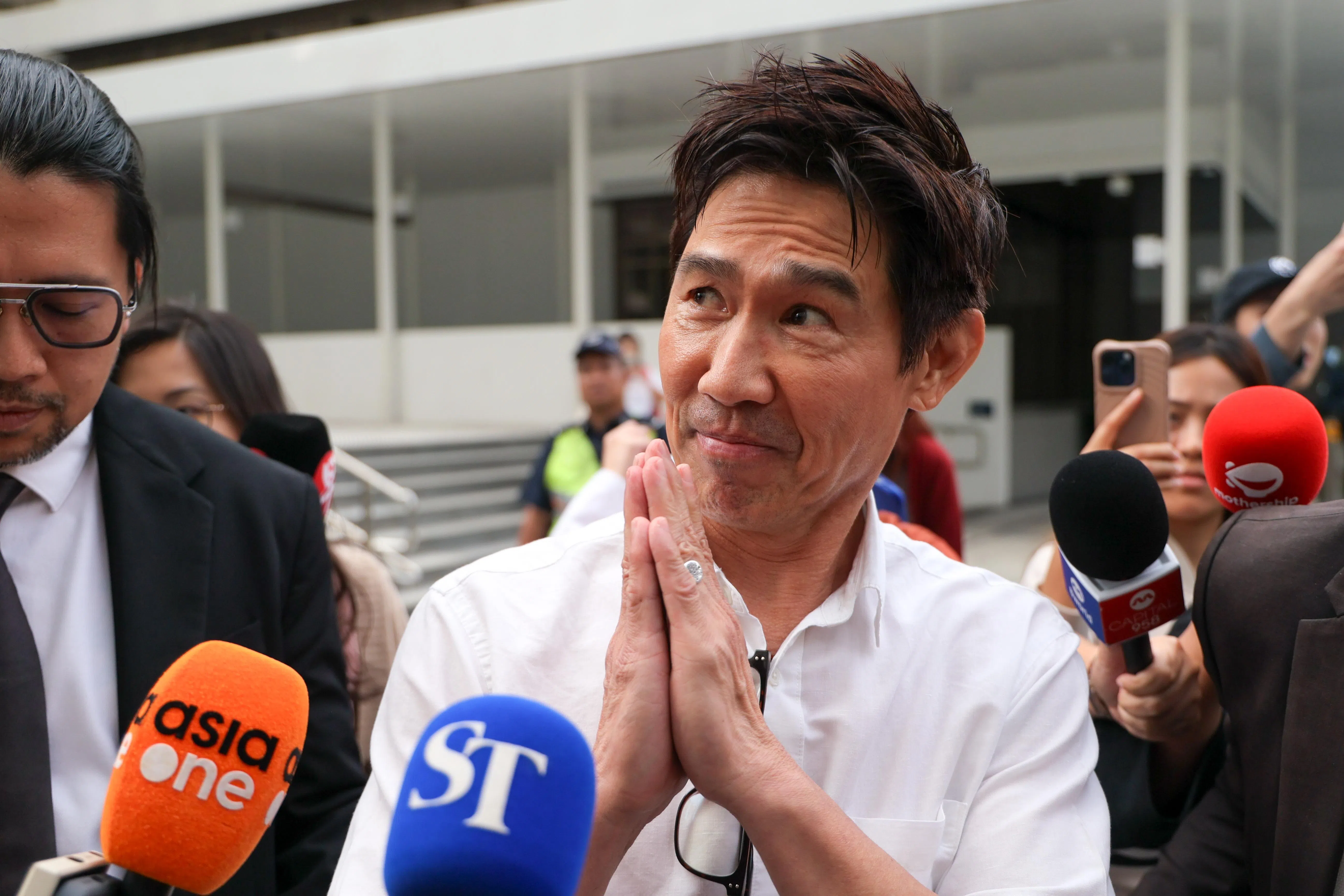 陈之财被判刑后在离开国家法院时眼眶泛红，向伤者致歉。（张俊杰摄）