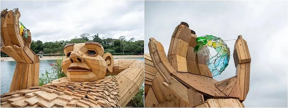 巨雕《梦想家迪伊》把玩着塑料球（小图），从乐观角度设想垃圾。（圣淘沙发展局提供图片）