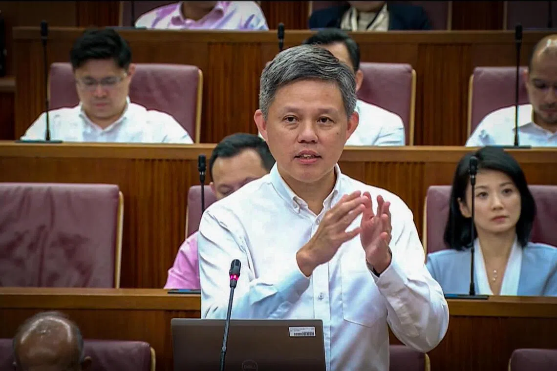 公共服务统筹部长兼国防部长陈振声星期二在国会总结政治薪金检讨部长声明的辩论时，逐一回应议员的建议。（gov.sg视频截图）