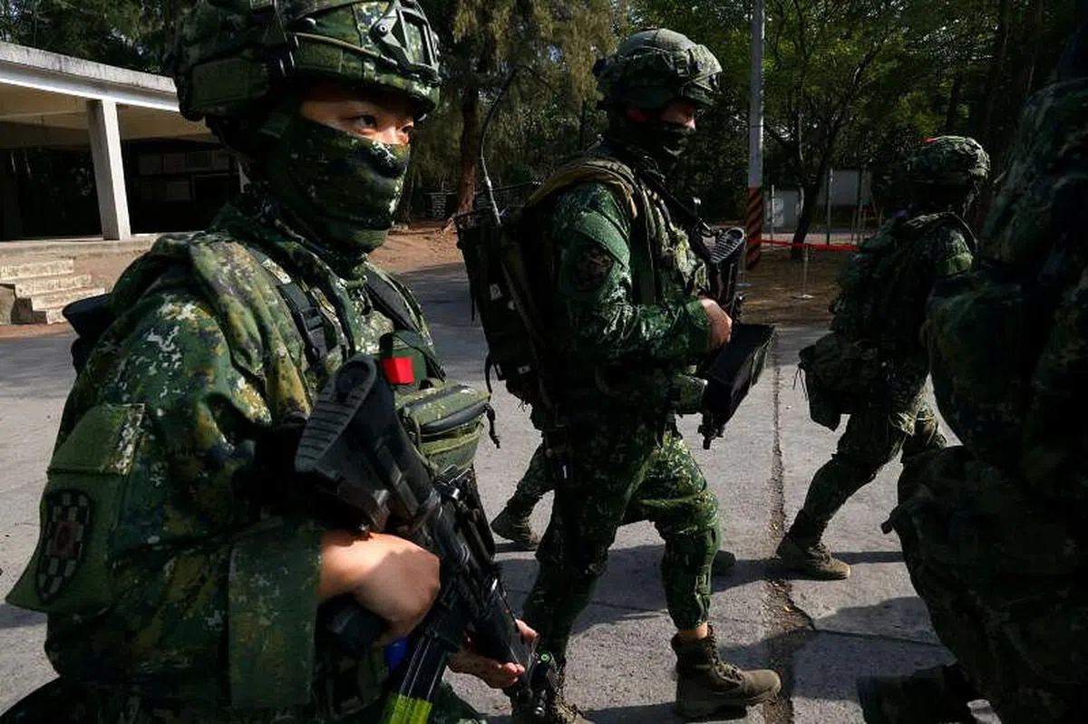 因应大陆解放军威胁，台湾陆军今年1月6日在高雄凤山陆军步兵训练指挥部进行城镇战对抗训练。（路透社）