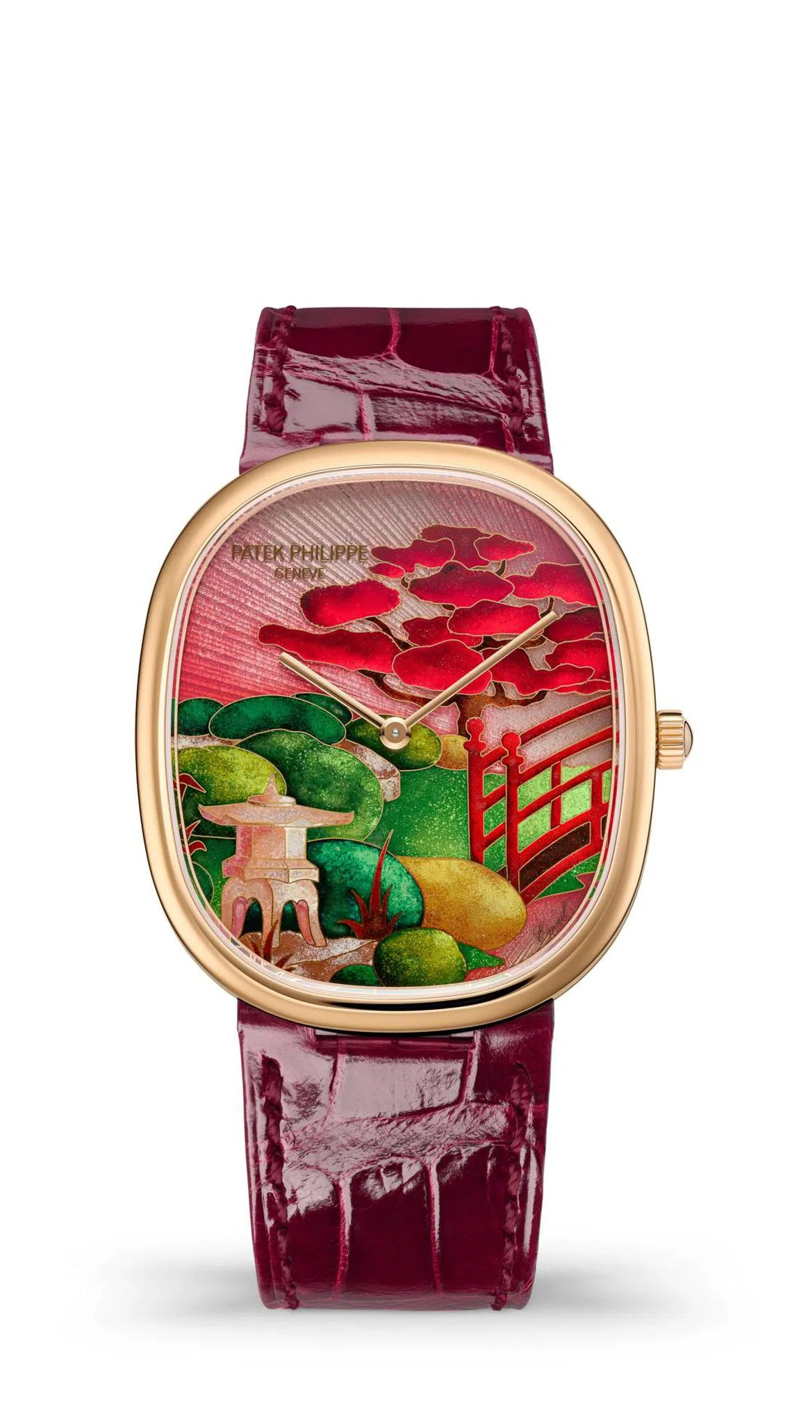 “日本花园”主题腕表表盘采用手工雕饰日辉纹图案，在半透明珐琅打造的天空营造绚丽光影效果，再以大明火掐丝珐琅工艺装饰。（百达翡丽提供）