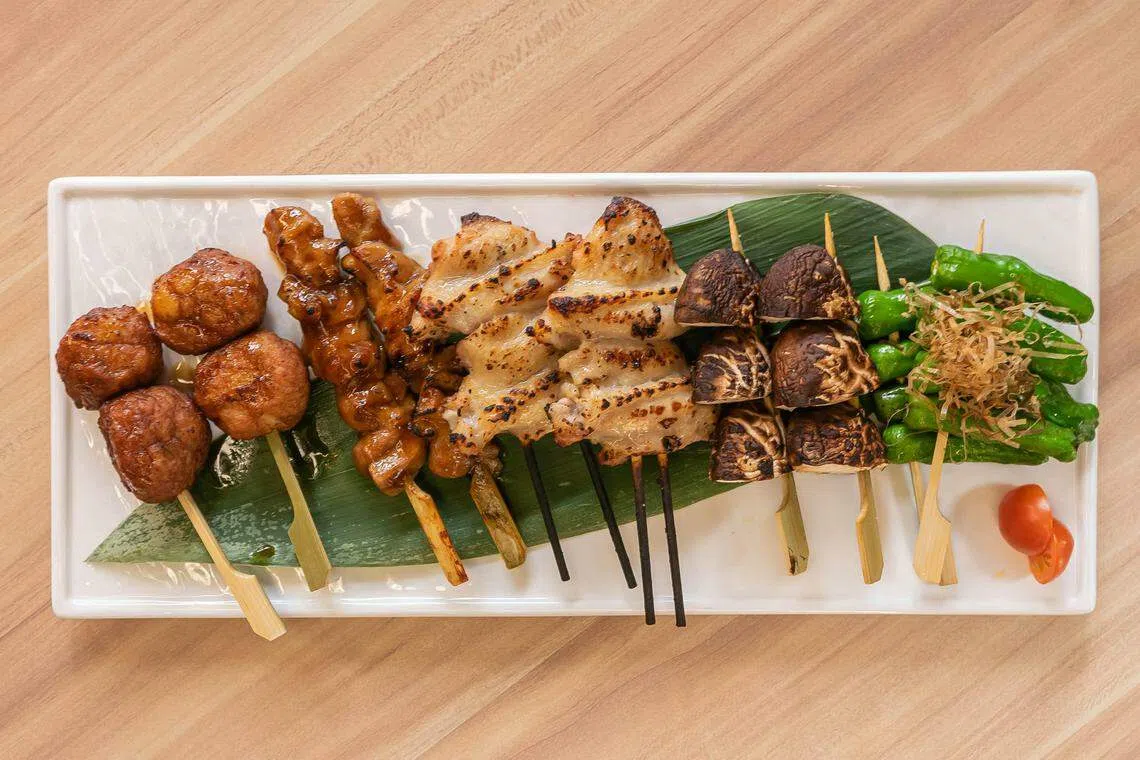 Takeshi-San日式居酒屋提供各种日式烤串。（餐馆提供）